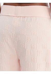 Hugo - HUGO Spodnie dresowe Monogram 50556809 Różowy jasny Regular Fit. Kolor: różowy. Materiał: bawełna #5