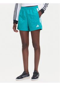 Adidas - adidas Szorty sportowe Tiro x Common Goal JL9208 Turkusowy Loose Fit. Kolor: turkusowy. Materiał: syntetyk
