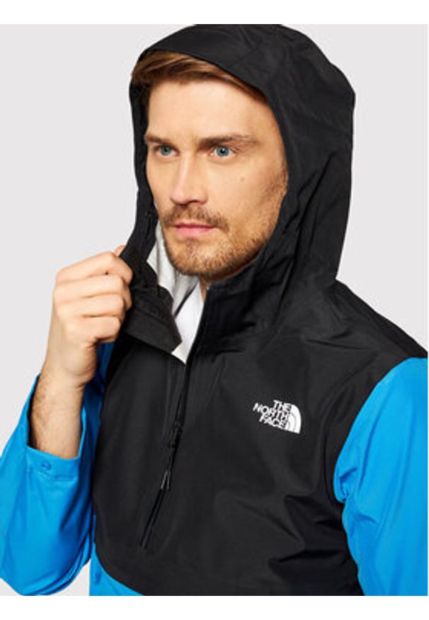 The North Face Wiatrówka Arque NF0A4AGX Niebieski Regular Fit. Kolor: niebieski. Materiał: syntetyk