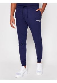 New Balance Spodnie dresowe C C F Pant MP03904 Granatowy Athletic Fit. Kolor: niebieski. Materiał: syntetyk, dresówka, bawełna