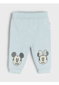 Sinsay - Spodnie dresowe Mickey Mouse - niebieski. Kolor: niebieski. Materiał: dresówka. Długość: długie. Wzór: motyw z bajki
