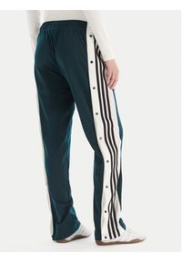 Adidas - adidas Spodnie dresowe Adibreak JV7515 Zielony Loose Fit. Kolor: zielony. Materiał: syntetyk