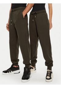 AMI PARIS - AMI Paris Spodnie dresowe UTR240.JE0091 Brązowy Regular Fit. Kolor: brązowy. Materiał: bawełna #1