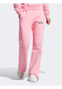 Adidas - adidas Spodnie dresowe ALL SZN Fleece Graphics Joggers IC8718 Różowy Regular Fit. Kolor: różowy. Materiał: bawełna #1