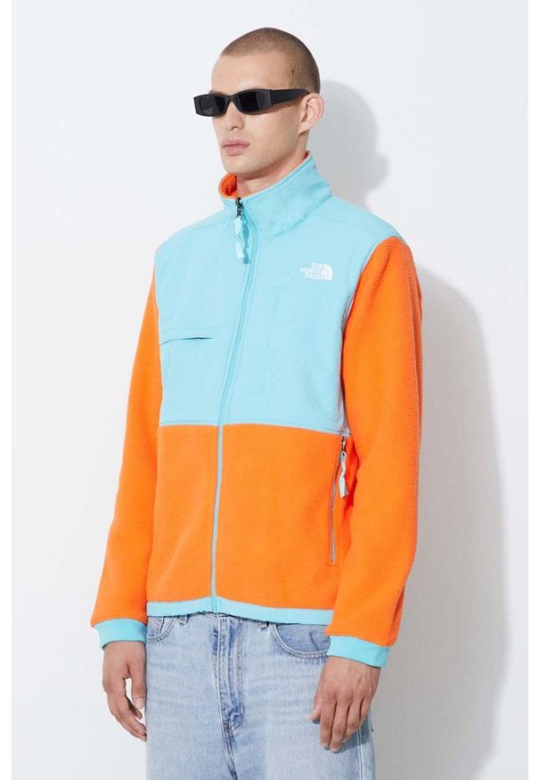 The North Face kurtka męska kolor pomarańczowy przejściowa. Kolor: pomarańczowy. Materiał: włókno, materiał