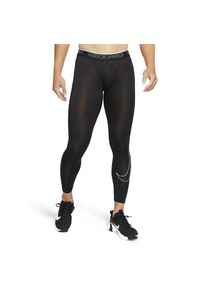 Spodnie treningowe męskie Nike Pro Drifit Tight. Kolor: czarny, biały, wielokolorowy. Materiał: poliester. Sport: bieganie