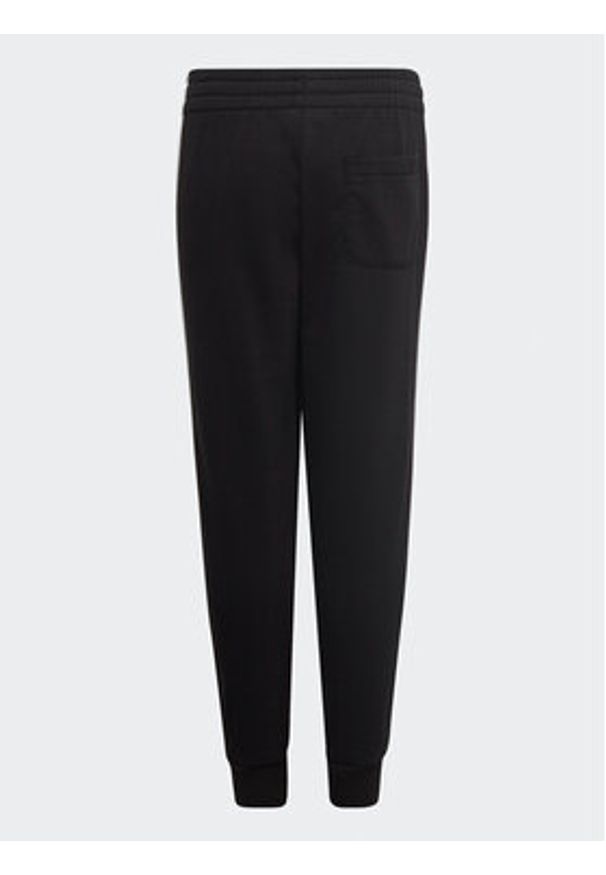 Adidas - adidas Spodnie dresowe adidas Essential 3-Stripes Joggers H65796 Czarny Regular Fit. Kolor: czarny. Materiał: bawełna