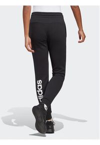 Adidas - adidas Spodnie dresowe Essentials Linear French Terry Cuffed Joggers IC6868 Czarny Slim Fit. Kolor: czarny. Materiał: bawełna #5