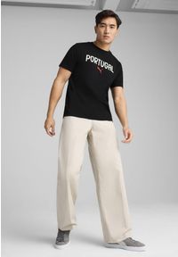 Puma - Męska koszulka Portugalia ftblNRGY PUMA Black. Kolor: czarny. Wzór: napisy
