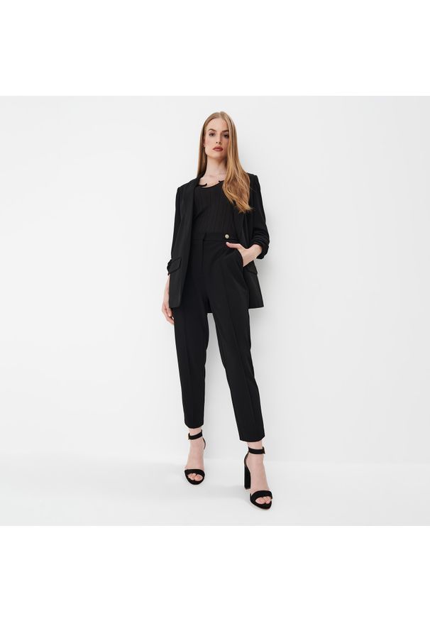 Mohito - Spodnie joggery - Czarny. Kolor: czarny