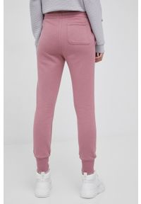 Converse spodnie damskie kolor różowy gładkie. Kolor: różowy. Wzór: gładki