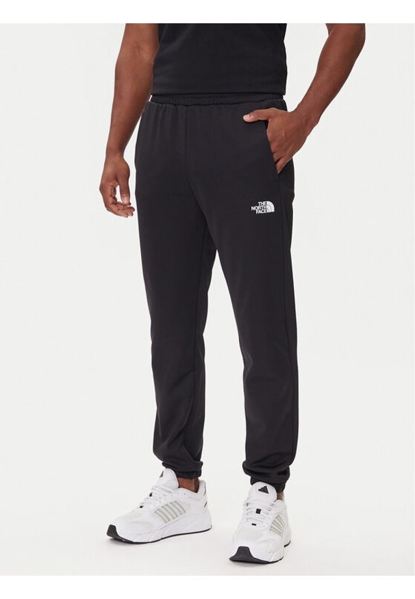 The North Face Spodnie dresowe Reaxion 2.0 NF0A8DRS Czarny Regular Fit. Kolor: czarny. Materiał: syntetyk
