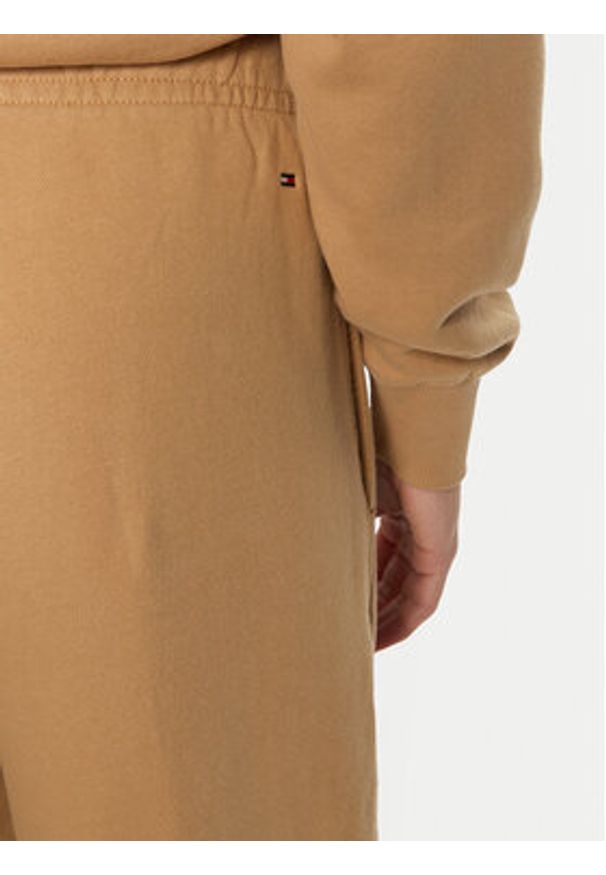 TOMMY HILFIGER - Tommy Hilfiger Spodnie dresowe WW0WW42883 Beżowy Regular Fit. Kolor: beżowy. Materiał: bawełna