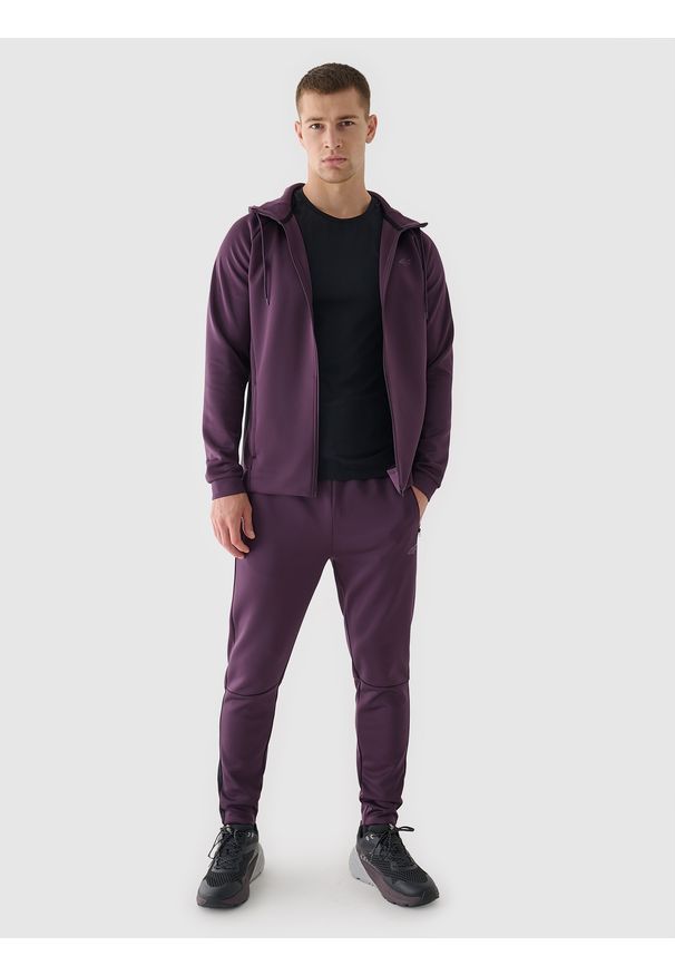 4f - 4F Spodnie treningowe szybkoschnące męskie - fioletowe L. Kolor: fioletowy. Materiał: syntetyk, włókno, dzianina, materiał, elastan. Wzór: jednolity, ze splotem. Sport: fitness