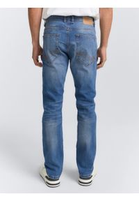 Męskie Spodnie Jeansowe Tom Tailor Josh Used Mid Stone Blue Denim Regular Slim Fit 1007860 10119. Okazja: na spotkanie biznesowe, na randkę, na co dzień. Długość: długie. Wzór: jednolity. Styl: klasyczny, biznesowy, casual, elegancki