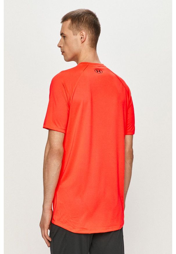 Under Armour - T-shirt. Kolor: pomarańczowy. Materiał: tkanina. Wzór: nadruk