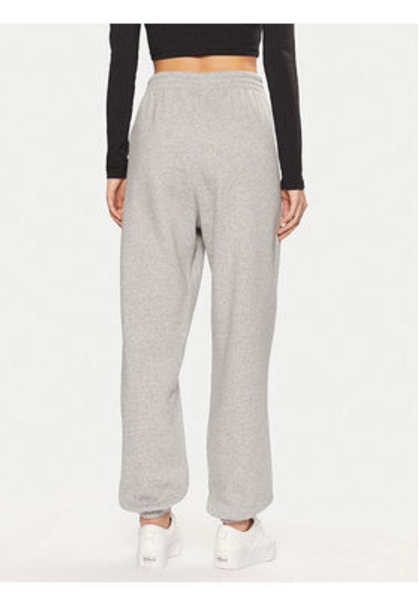 Adidas - adidas Spodnie dresowe Essentials Fleece IY9638 Szary Loose Fit. Kolor: szary. Materiał: bawełna