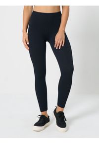Sinsay - Sportowe legginsy bezszwowe - czarny. Kolor: czarny. Styl: sportowy