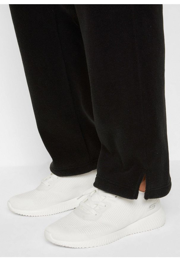 bonprix - Polarowe spodnie z elastyczną gumką w talii. Okazja: na co dzień. Kolor: czarny. Materiał: polar. Styl: casual