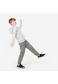 Decathlon - Spodnie dresowe dziecięce Domyos cargo. Kolor: zielony. Materiał: materiał, poliester, elastan