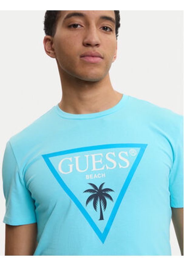 Guess T-Shirt F6GI09 J1314 Niebieski Slim Fit. Kolor: niebieski. Materiał: bawełna