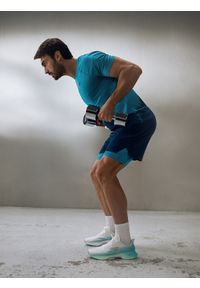 4f - 4F Spodenki treningowe szybkoschnące męskie - turkusowe XXL. Kolor: turkusowy. Materiał: skóra. Sport: fitness #1