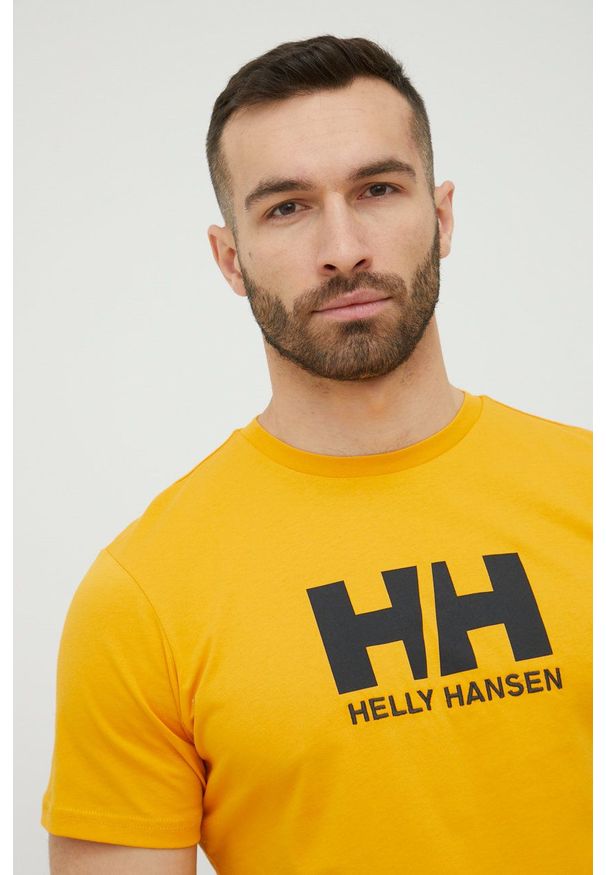 Helly Hansen - T-shirt. Okazja: na co dzień. Kolor: żółty. Materiał: dzianina. Wzór: aplikacja. Styl: casual
