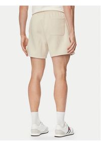 Tommy Jeans Szorty sportowe DM0DM21931 Beżowy jasny Regular Fit. Kolor: beżowy. Materiał: bawełna. Styl: sportowy #4