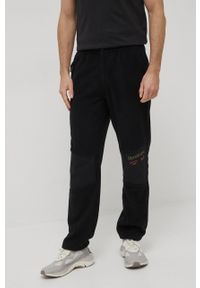 Reebok Classic spodnie HB5957 męskie kolor czarny proste. Kolor: czarny. Materiał: poliester. Wzór: aplikacja #1