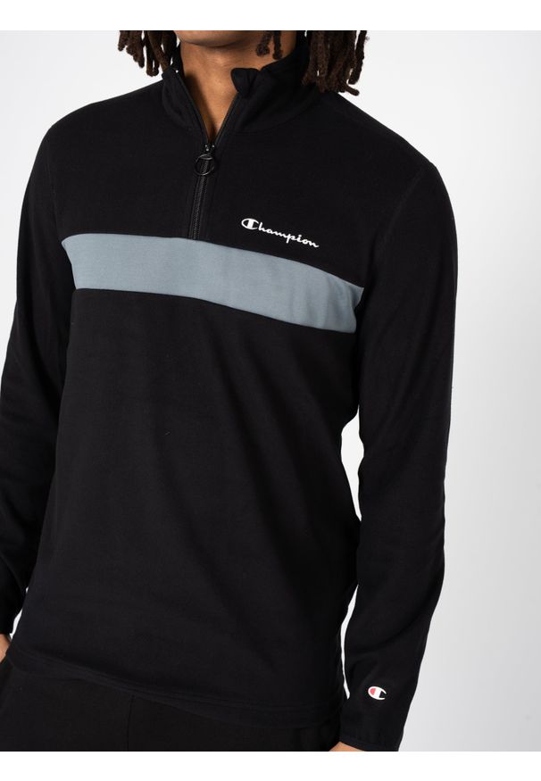 Champion Bluza | 218103 | Mężczyzna | Czarny. Okazja: na co dzień. Typ kołnierza: kołnierzyk stójkowy. Kolor: czarny. Materiał: poliester. Styl: sportowy, elegancki, casual