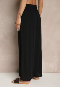 Renee - Czarne Szerokie Spodnie z Wiskozy ze Sznurkiem Natisetia. Okazja: na co dzień. Kolor: czarny. Materiał: wiskoza. Styl: casual, elegancki