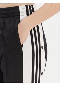 Adidas - adidas Spodnie dresowe Adibreak KD2932 Czarny Loose Fit. Kolor: czarny. Materiał: syntetyk #3