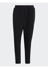 Adidas - adidas Spodnie dresowe Terrex Multi Primegreen GM4771 Czarny Slim Fit. Kolor: czarny. Materiał: syntetyk, dresówka