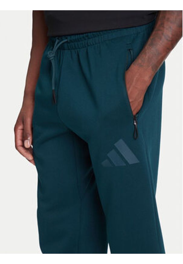 Adidas - adidas Spodnie dresowe Z.N.E. JW4724 Zielony Loose Fit. Kolor: zielony. Materiał: bawełna