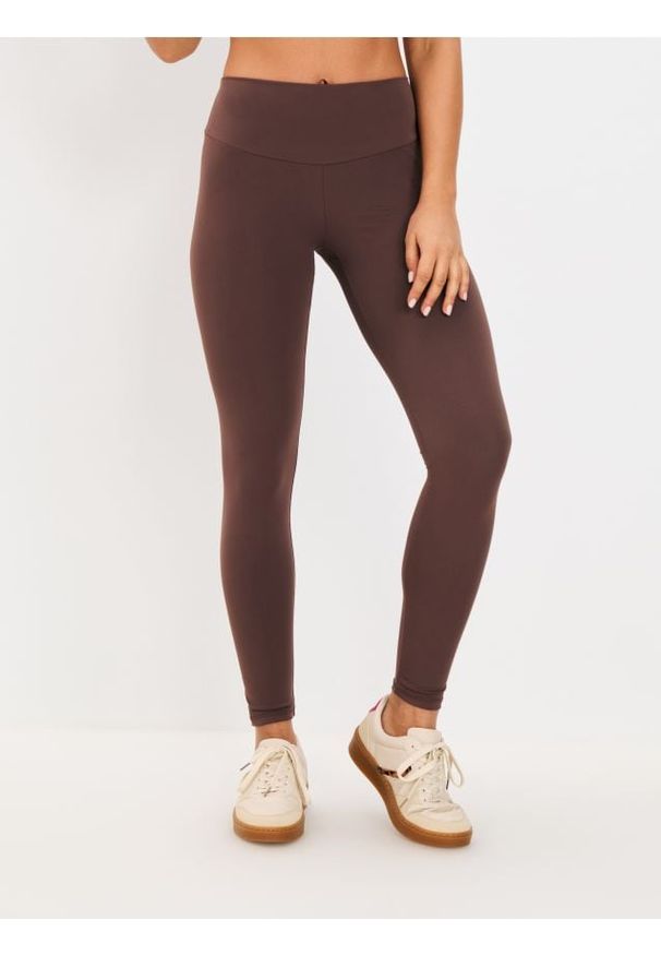Sinsay - Legginsy GYM HARD - brązowy. Kolor: brązowy