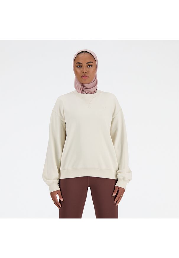 Bluza damska New Balance WT41500LIN – beżowa. Kolor: beżowy. Materiał: tkanina, dresówka, prążkowany, bawełna