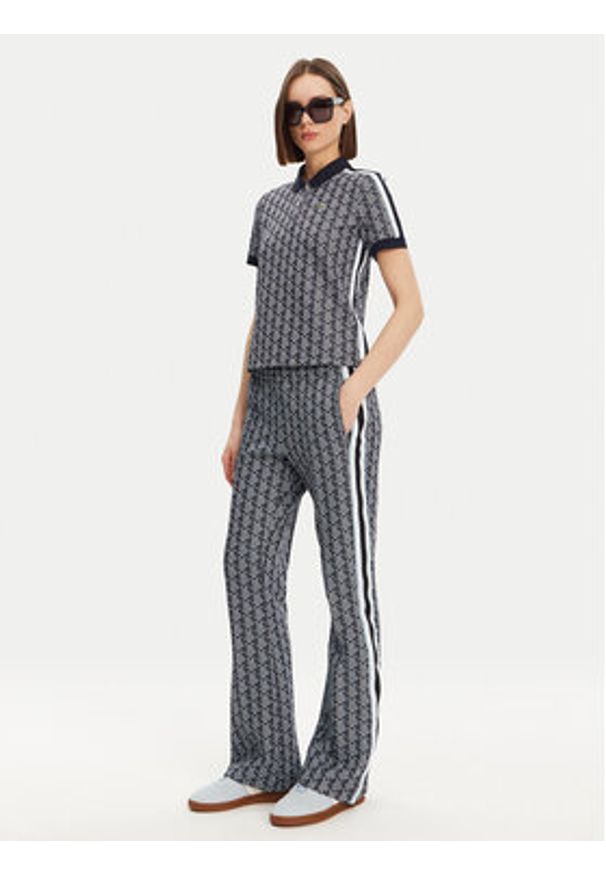 Lacoste Spodnie dresowe XF9313 Granatowy Regular Fit. Kolor: niebieski. Materiał: syntetyk, bawełna