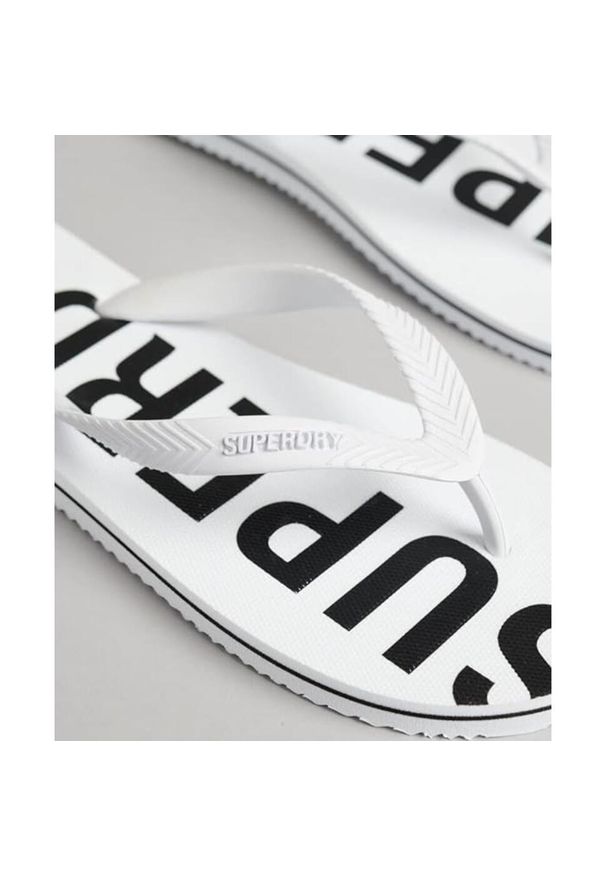 Japonki plażowe męskie Superdry Code Essential Flip Flop. Okazja: na plażę. Kolor: biały. Sport: pływanie, fitness