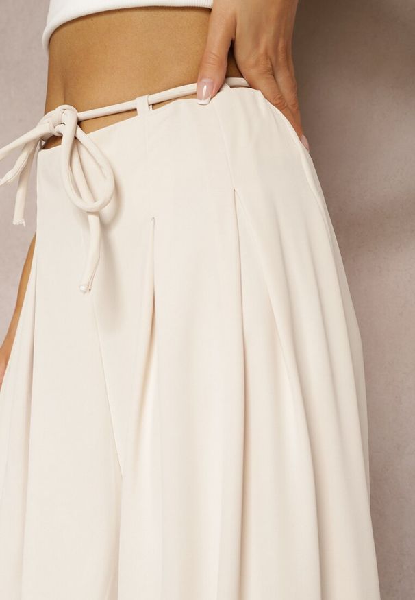 Renee - Jasnobeżowe Szerokie Spodnie High Waist Zapinane na Suwak z Wiązaniem w Talii Vikonnia. Okazja: na co dzień. Stan: podwyższony. Kolor: beżowy. Styl: klasyczny, elegancki, casual