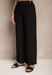 Renee - Czarne Spodnie Typu Palazzo o Szerokim Kroju High Waist Ozdobione Wiązaniem Yaslevia. Okazja: na co dzień. Stan: podwyższony. Kolor: czarny. Wzór: aplikacja. Styl: casual, elegancki #5