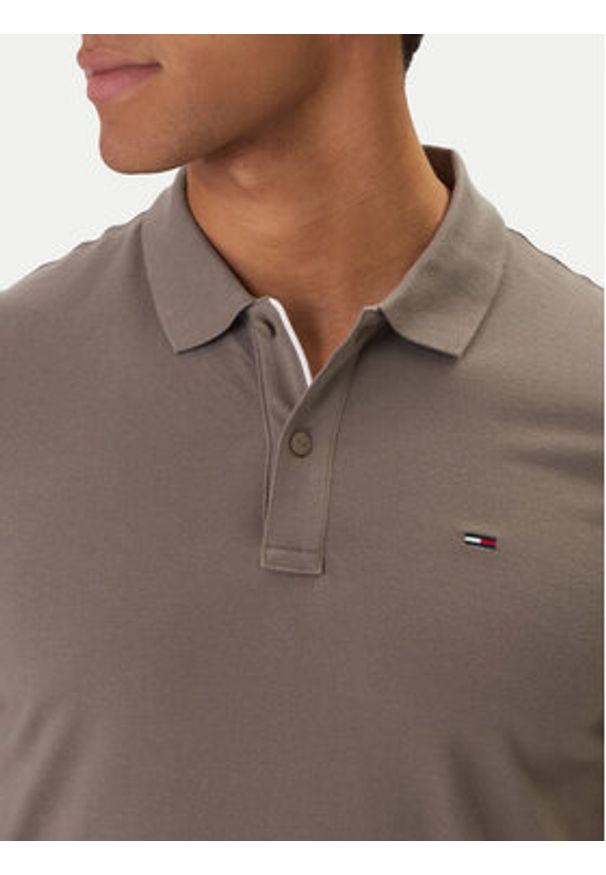 Tommy Jeans Polo DM0DM20676 Beżowy Slim Fit. Typ kołnierza: polo. Kolor: beżowy. Materiał: bawełna