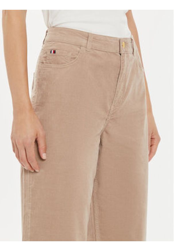 TOMMY HILFIGER - Tommy Hilfiger Spodnie materiałowe WW0WW43631 Beżowy Relaxed Fit. Kolor: beżowy. Materiał: bawełna