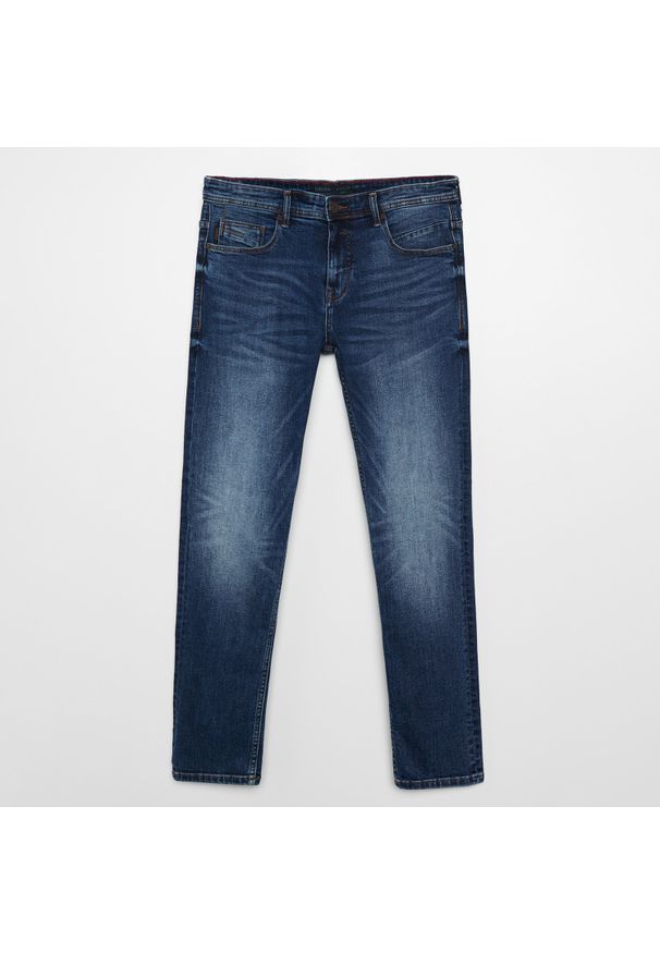 Cropp - Jeansy slim z przetarciami - Granatowy. Kolor: niebieski. Materiał: jeans