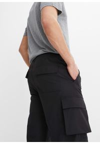bonprix - Spodnie funkcjonalne 3/4, Regular Fit. Kolor: czarny