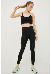 Guess biustonosz sportowy kolor czarny. Kolor: czarny. Materiał: skóra. Rodzaj stanika: odpinane ramiączka. Wzór: nadruk #2