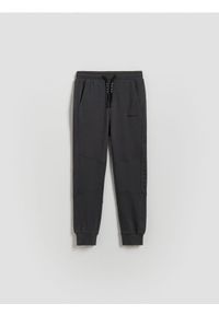 Reserved - Sportowe spodnie slim fit - ciemnoszary. Kolor: szary. Materiał: dzianina, bawełna. Styl: sportowy #1