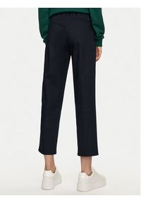 TOMMY HILFIGER - Tommy Hilfiger Chinosy Travel WW0WW43632 Granatowy Slim Fit. Kolor: niebieski. Materiał: syntetyk, bawełna #4