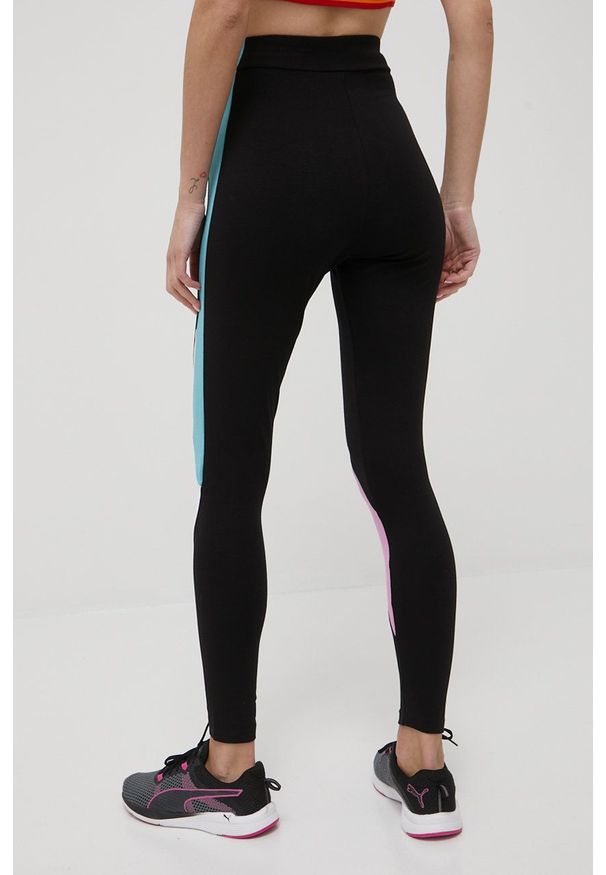 Puma legginsy SWxP 533575 damskie kolor czarny wzorzyste. Kolor: czarny. Materiał: skóra, bawełna, dzianina