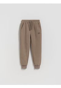 Reserved - Bawełniane joggery z meszkiem - ciemnobrązowy. Kolor: brązowy. Materiał: bawełna #1
