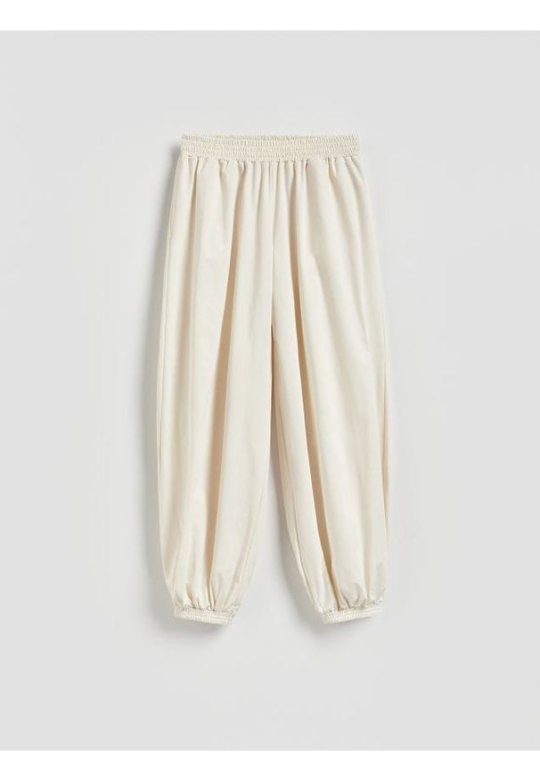 Reserved - Spodnie balloon - złamana biel. Materiał: dzianina. Wzór: gładki